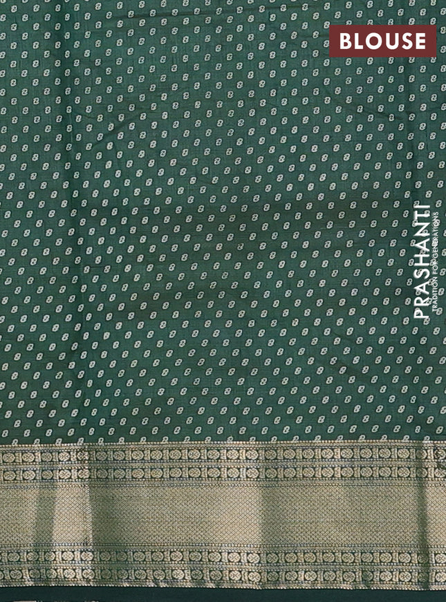 Semi raw silk saree bottle green with allover butta prints and zari woven border