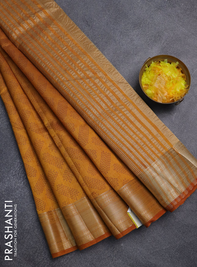 Semi raw silk saree dark mustard with allover butta prints and zari woven border