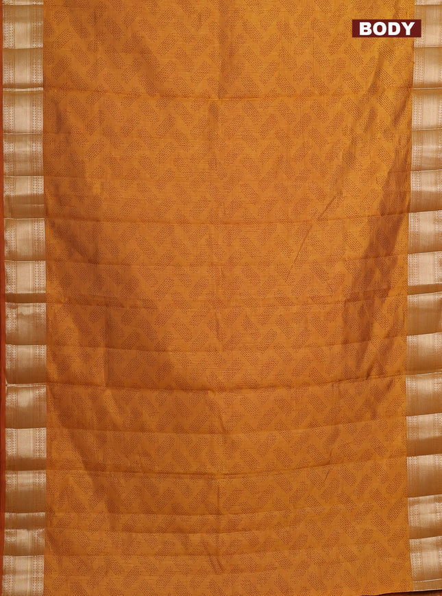 Semi raw silk saree dark mustard with allover butta prints and zari woven border