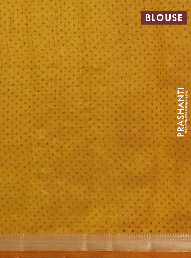 Semi raw silk saree mustard yellow with allover leaf butta prints and zari woven border