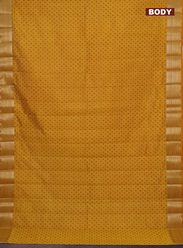 Semi raw silk saree mustard yellow with allover butta prints and zari woven border