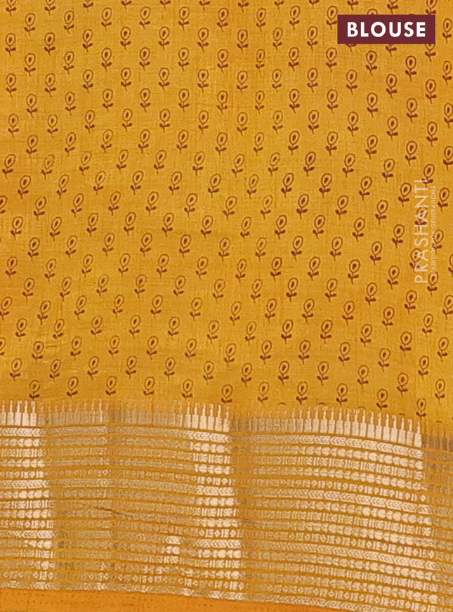 Semi raw silk saree mustard yellow with allover butta prints and zari woven border