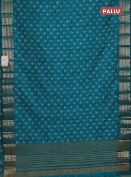 Semi raw silk saree teal green with allover butta prints and zari woven border