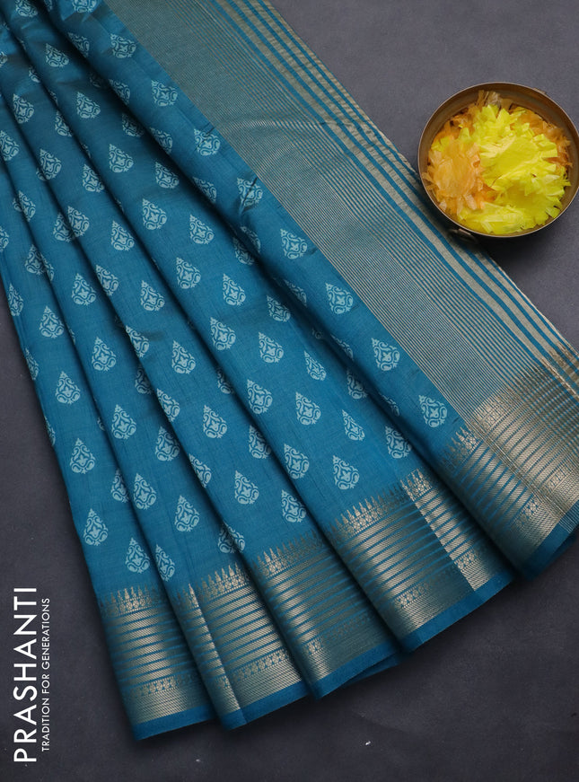 Semi raw silk saree cs blue with allover butta prints and zari woven border