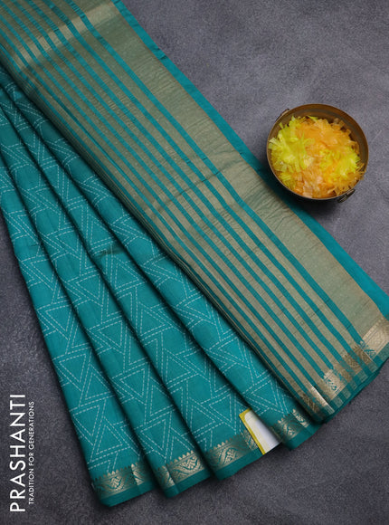 Semi raw silk saree teal green with allover geometric prints and zari woven border