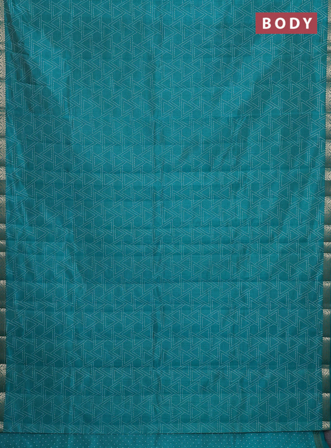 Semi raw silk saree teal green with allover geometric prints and zari woven border
