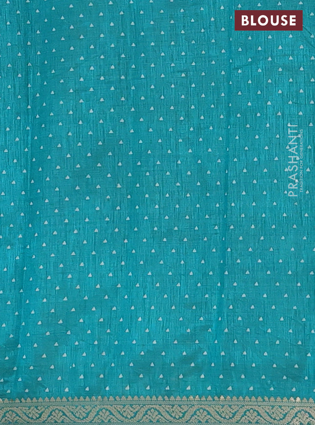 Semi raw silk saree teal green with allover geometric prints and zari woven border