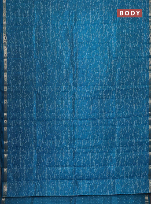 Semi raw silk saree peacock blue with allover geometric prints and zari woven border