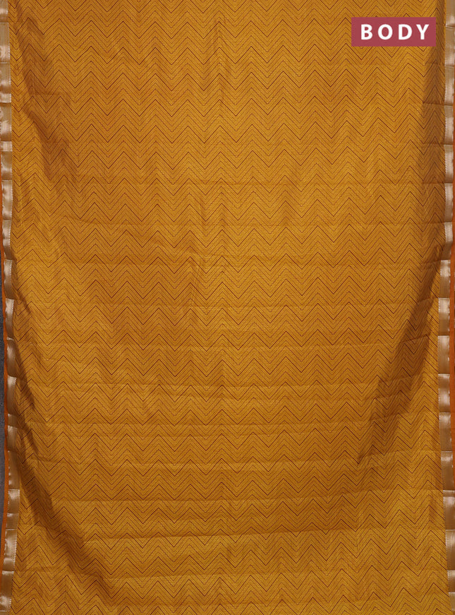 Semi raw silk saree mustard yellow with allover zig zag prints and zari woven border