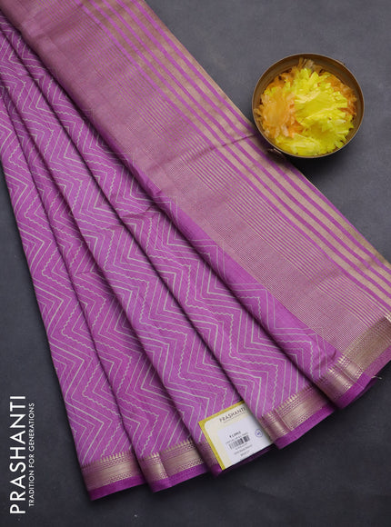 Semi raw silk saree lavender with allover zig zag prints and zari woven border