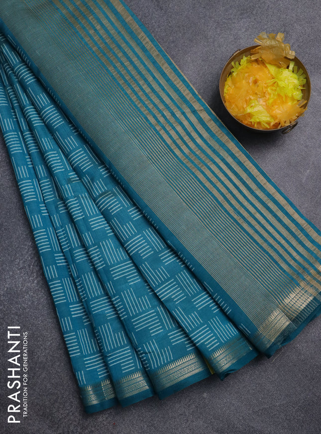 Semi raw silk saree teal blue with allover geometric prints and zari woven border