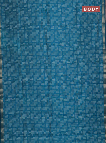 Semi raw silk saree teal blue with allover geometric prints and zari woven border