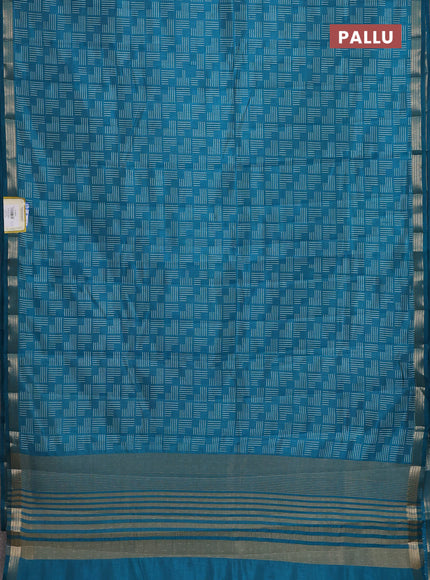Semi raw silk saree teal blue with allover geometric prints and zari woven border