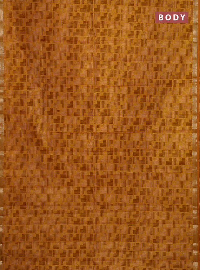 Semi raw silk saree dark mustard with allover geometric prints and zari woven border