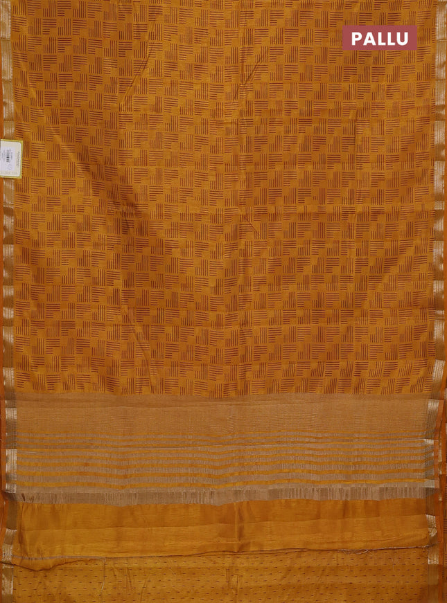 Semi raw silk saree dark mustard with allover geometric prints and zari woven border