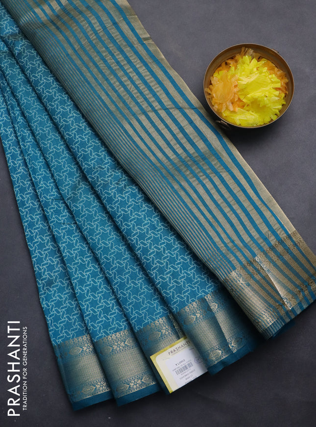 Semi raw silk saree cs blue with allover geometric prints and zari woven border
