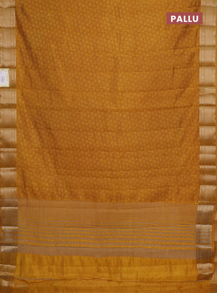 Semi raw silk saree dark mustard with allover geometric prints and zari woven border