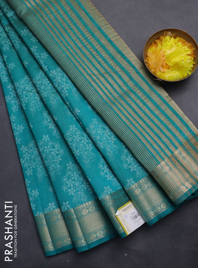 Semi raw silk saree teal green with allover floral butta prints and zari woven border