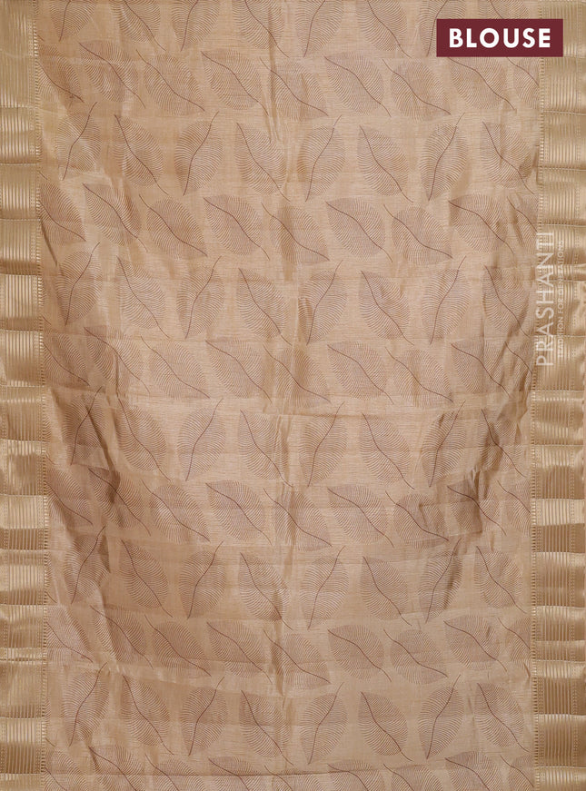 Semi raw silk saree sandal with allover leaf butta prints and zari woven border