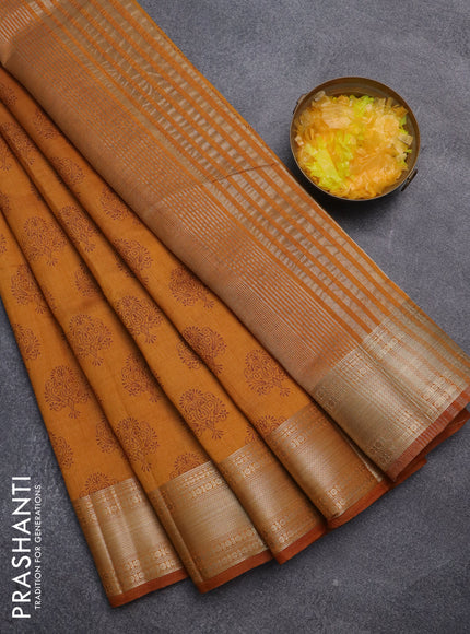 Semi raw silk saree dark mustard with allover butta prints and zari woven border