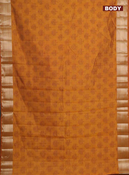 Semi raw silk saree dark mustard with allover butta prints and zari woven border