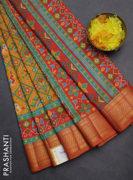 Semi tussar saree mustard yellow and red shade with allover ikat prints and zari woven border