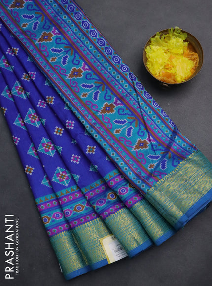 Semi tussar saree blue with allover ikat butta prints and zari woven border