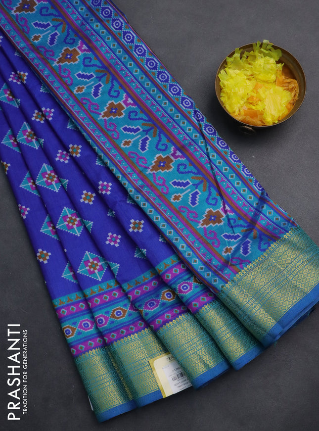 Semi tussar saree blue with allover ikat butta prints and zari woven border