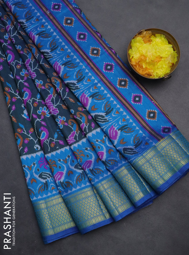 Semi tussar saree dual shade of bluish green and cs blue with allover ikat prints and zari woven border