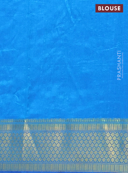 Semi tussar saree dual shade of bluish green and cs blue with allover ikat prints and zari woven border