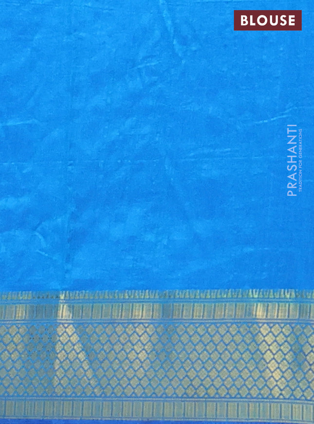 Semi tussar saree dual shade of bluish green and cs blue with allover ikat prints and zari woven border