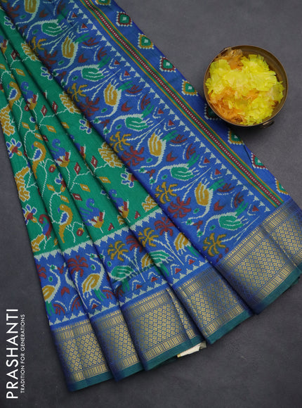 Semi tussar saree green and blue with allover ikat prints and zari woven border
