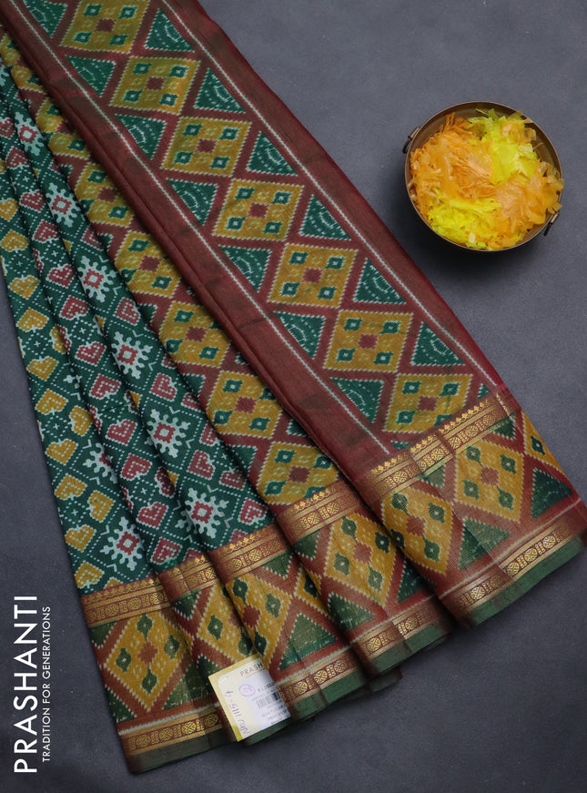 Semi tussar saree green with allover ikat prints and zari woven border