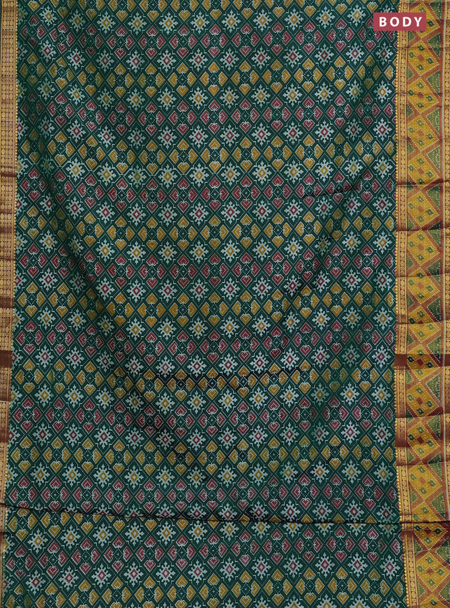 Semi tussar saree green with allover ikat prints and zari woven border