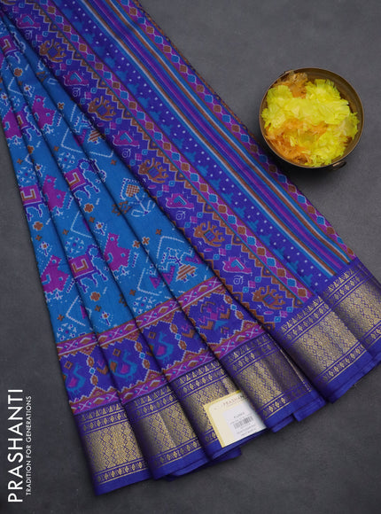 Semi tussar saree cs blue and blue with allover ikat prints and zari woven border