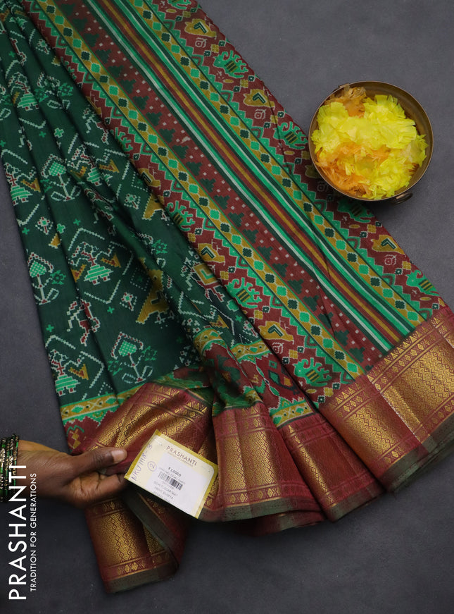 Semi tussar saree green and maroon with allover ikat prints and zari woven border