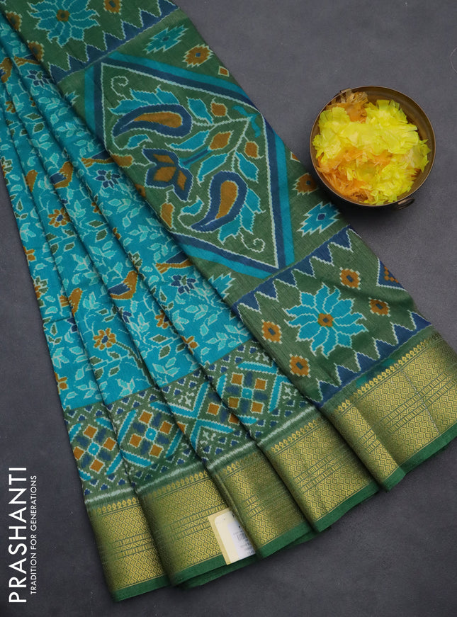 Semi tussar saree teal blue and green with allover ikat prints and zari woven border