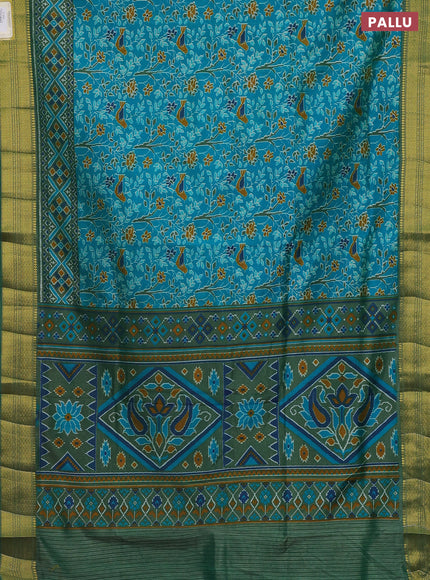 Semi tussar saree teal blue and green with allover ikat prints and zari woven border