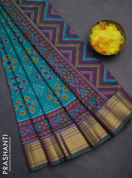 Semi tussar saree teal blue and purple with allover ikat prints and zari woven border
