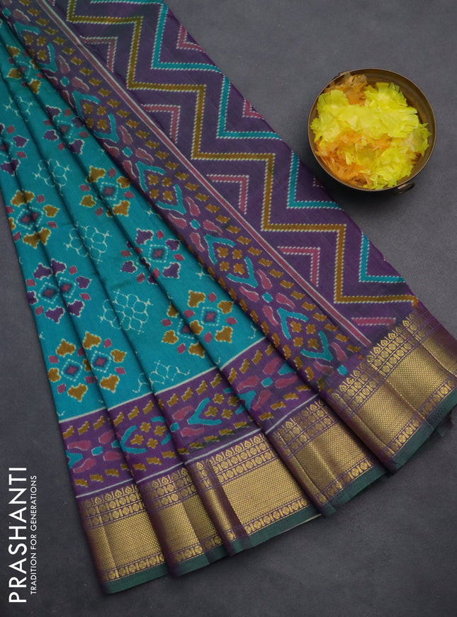 Semi tussar saree teal blue and purple with allover ikat prints and zari woven border