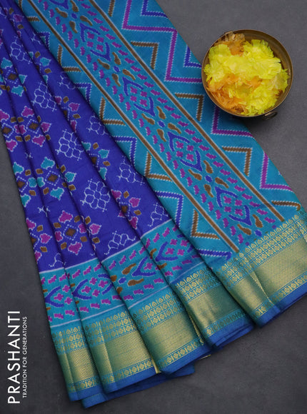 Semi tussar saree blue shade and teal blue with allover ikat prints and zari woven border