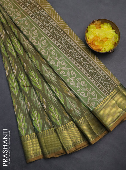 Semi tussar saree green shade with allover ikat prints and zari woven border