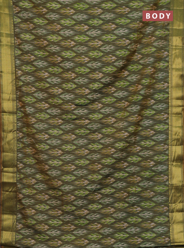 Semi tussar saree green shade with allover ikat prints and zari woven border