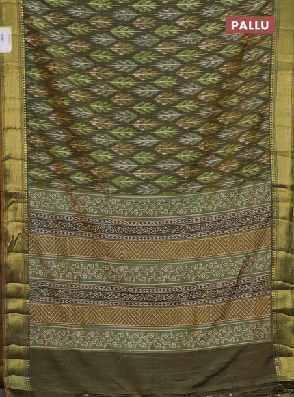 Semi tussar saree green shade with allover ikat prints and zari woven border