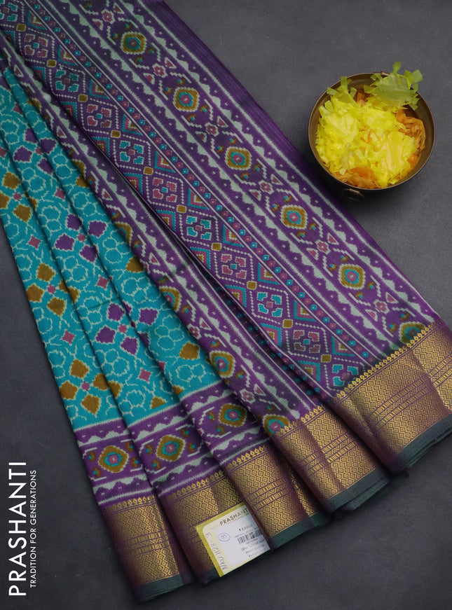 Semi tussar saree teal blue and purple with allover ikat prints and zari woven border