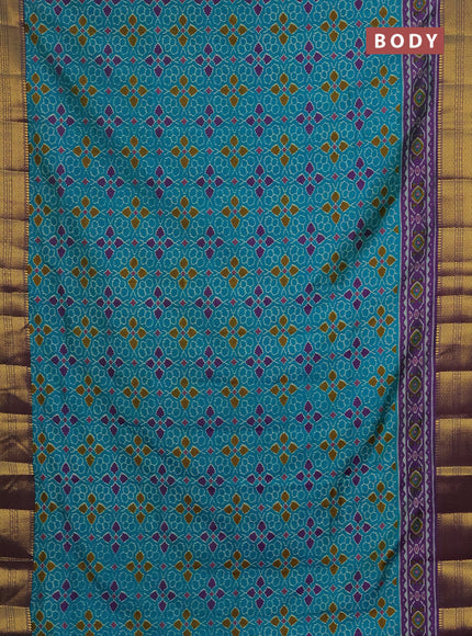 Semi tussar saree teal blue and purple with allover ikat prints and zari woven border