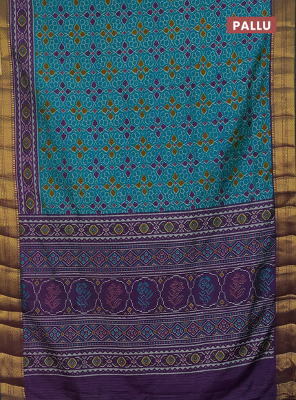 Semi tussar saree teal blue and purple with allover ikat prints and zari woven border