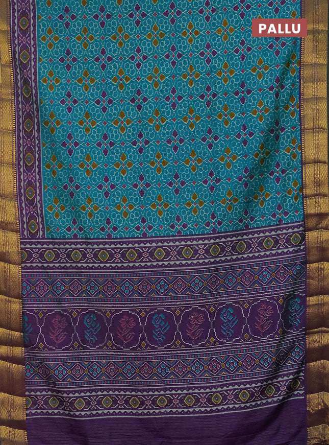 Semi tussar saree teal blue and purple with allover ikat prints and zari woven border