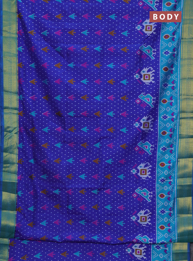 Semi tussar saree blue and teal blue with allover ikat prints and zari woven border