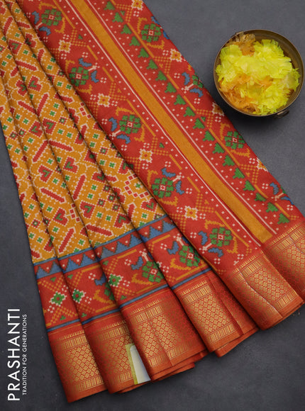 Semi tussar saree mustard yellow and red shade with allover ikat prints and zari woven border